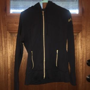 Black a gold under armor zip up jacket